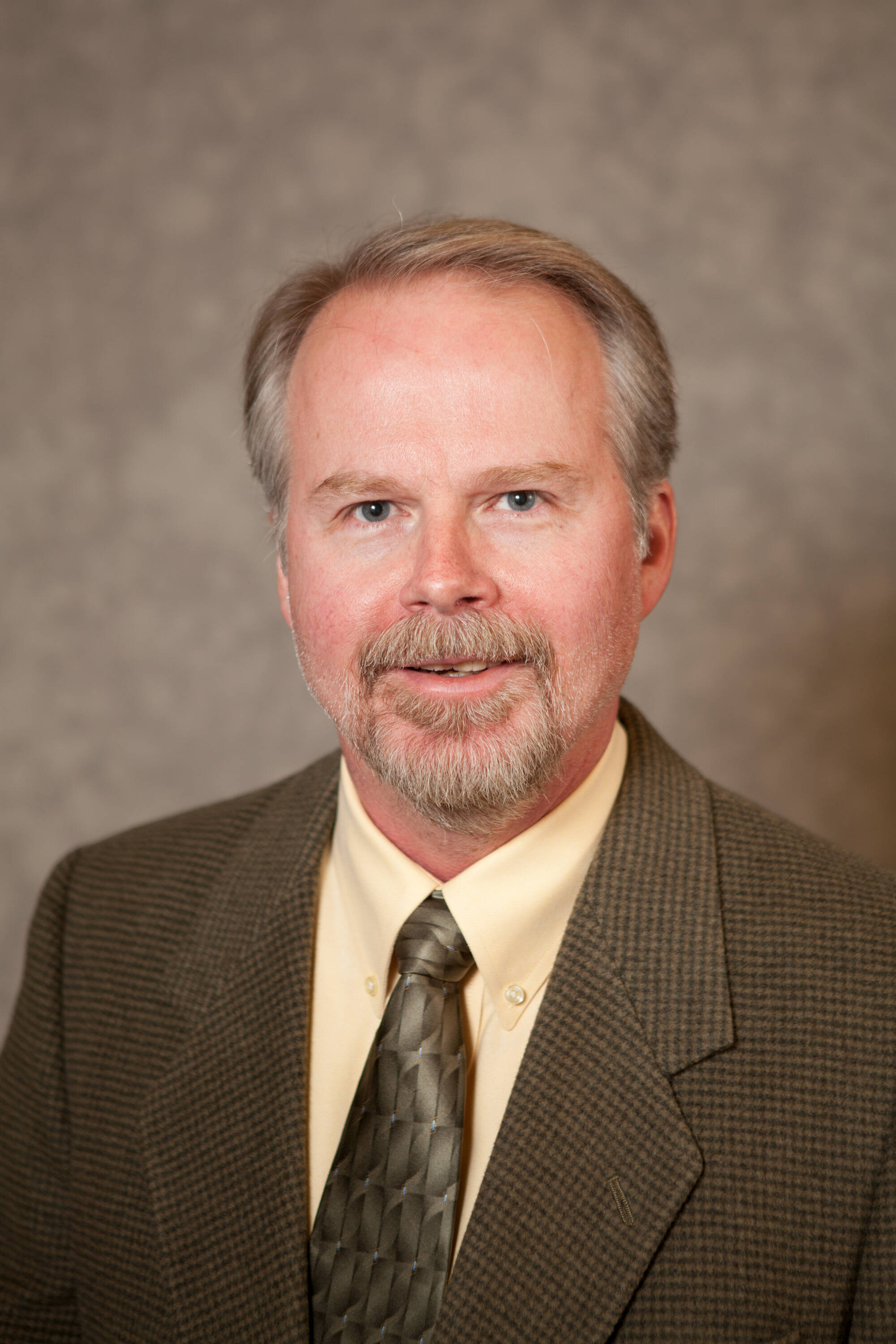 Engineering faculty and staff headshots taken on 08/25/2011 and 10/05/2001